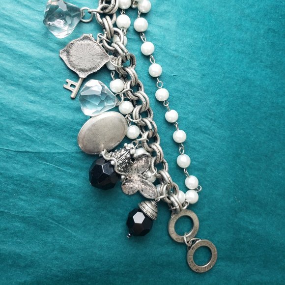 2/25$ Silver tone bracelet with charms and locket - Picture 5 of 5